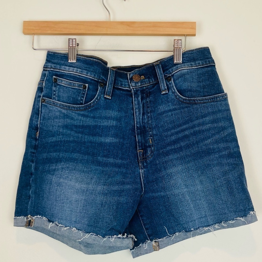 J. Crew medium wash mid-thigh cutoff denim shorts. Size 27